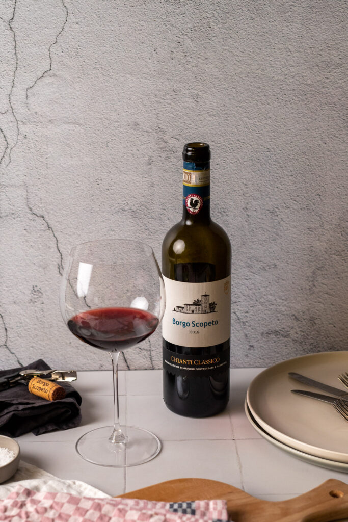 Dieses Bild zeigt den Wein und das Etikett des Borgo Scopeto von 2018 welcher super zur Lasagne passt.